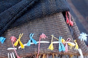 Tassles decorate the down straps of the tent