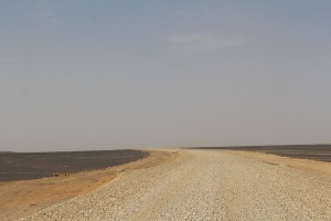 The white sand road through the black sand desert