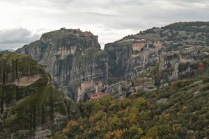 Almost impossible to see amongst the trees and rocks, a cluster of monasteries in Meteora