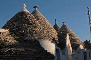Different keystones top each trullo, depending on the owners preference