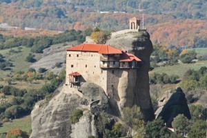The monasteries blend into the rocks and autumn colours